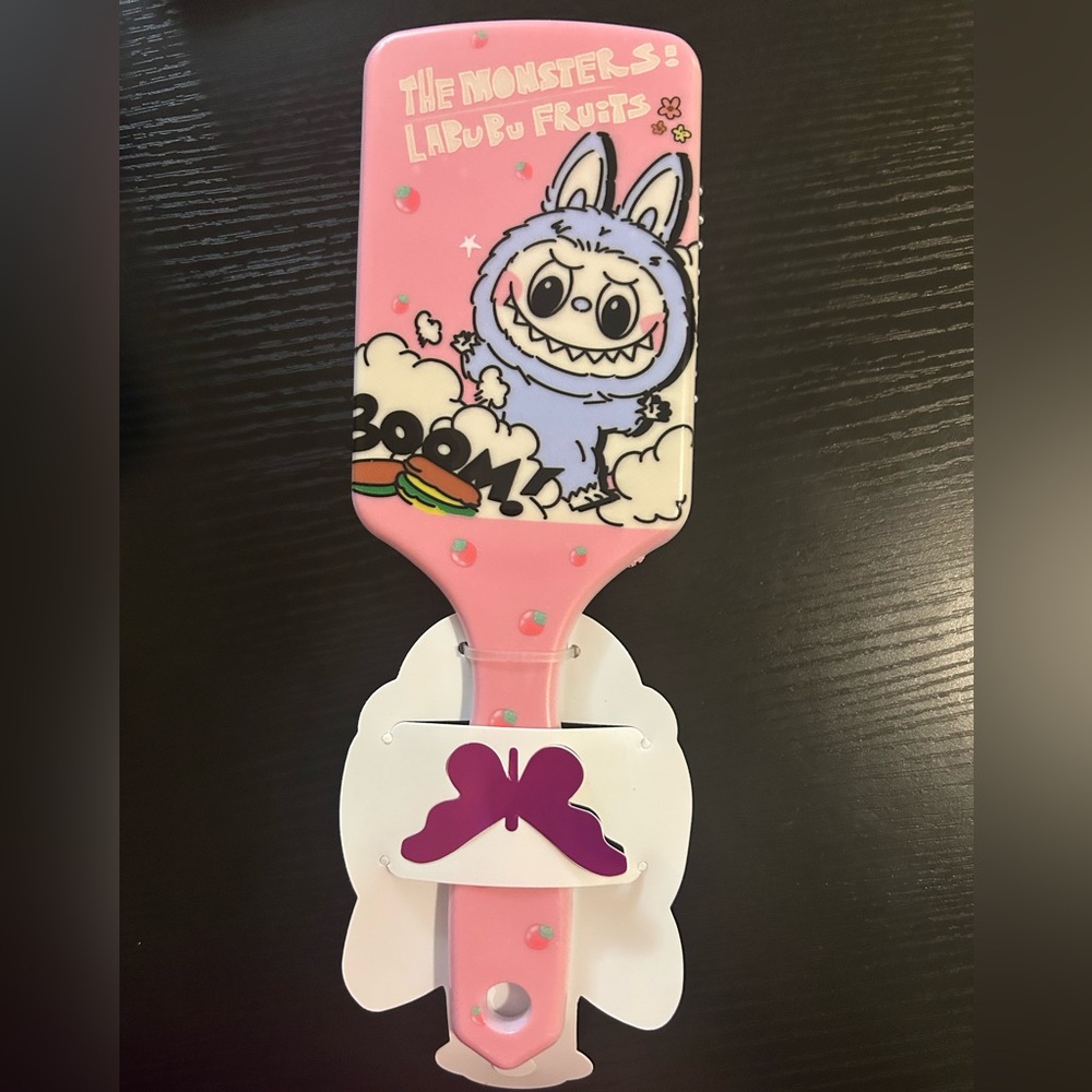 Playful Pink Kids Hair Brush with Cartoon Monster Design